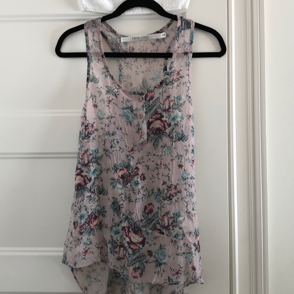 Floral racer back high-low tank.